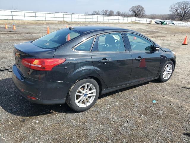 Снимка 3 от търг – 2015 FORD FOCUS SE с VIN 1FADP3F21FL305057