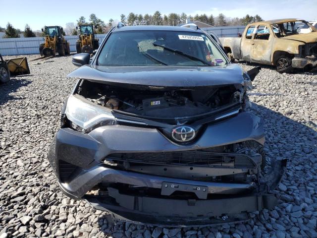 Photo 5 from auction – 2018 TOYOTA RAV4 LE with VIN JTMBFREV5JJ258574