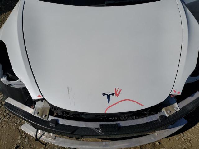 Снимка 11 от търг – 2023 TESLA MODEL 3 с VIN 5YJ3E1EA1PF448362