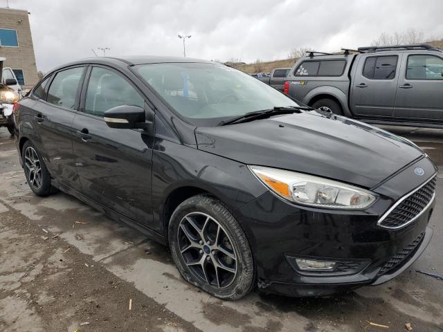 Photo 4 from auction – 2015 FORD FOCUS SE with VIN 1FADP3F25FL306115