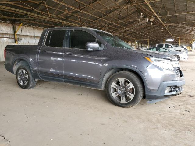 Photo 4 from auction – 2017 HONDA RIDGELINE with VIN 5FPYK3F64HB001781