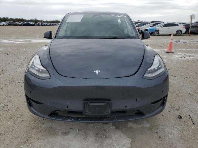 Photo 5 from auction – 2021 TESLA MODEL Y with VIN 5YJYGDEEXMF145838