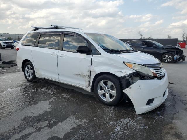 Photo 4 from auction – 2015 TOYOTA SIENNA LE with VIN 5TDKK3DCXFS690175