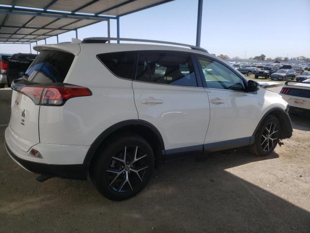 Photo 3 from auction – 2016 TOYOTA RAV4 SE with VIN JTMJFREV7GJ083524