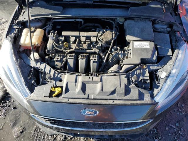 Photo 11 from auction – 2015 FORD FOCUS SE with VIN 1FADP3F25FL296296