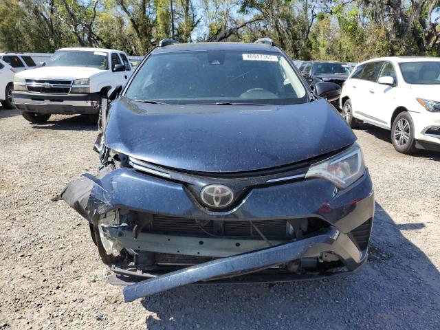 Photo 5 from auction – 2018 TOYOTA RAV4 LE with VIN JTMZFREV7JJ747671