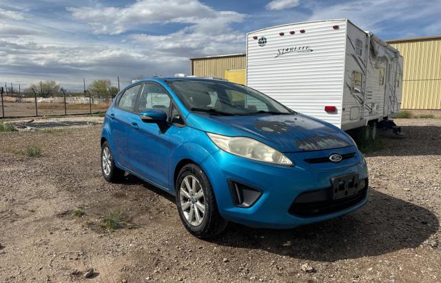 FORD FIESTA SE 2013 with VIN 3FADP4EJ0DM141097 - Photo from auction