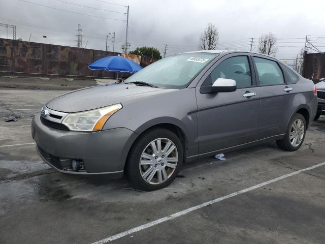 FORD FOCUS SEL 2011 with VIN 1FAHP3HN3BW180872 - Photo from auction