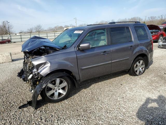 HONDA PILOT TOUR 2014 with VIN 5FNYF4H99EB031008 - Photo from auction