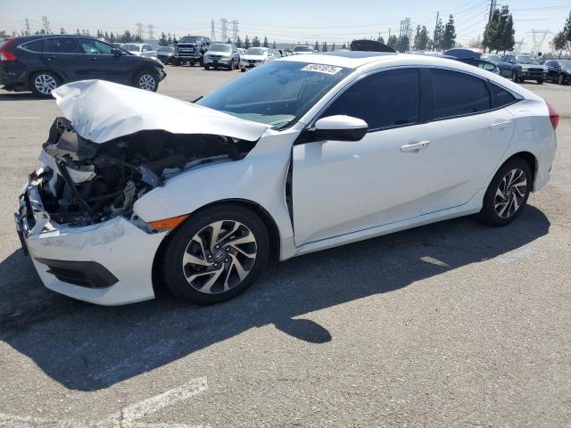 HONDA CIVIC EX 2016 с VIN 2HGFC2F79GH560740 - Снимка от търг