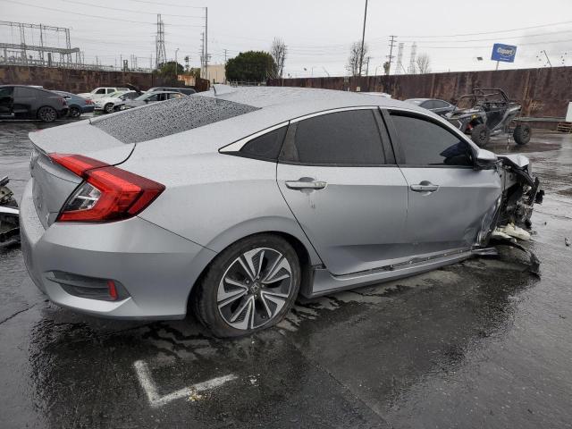 Photo 3 from auction – 2018 HONDA CIVIC EX with VIN JHMFC1F38JX042920