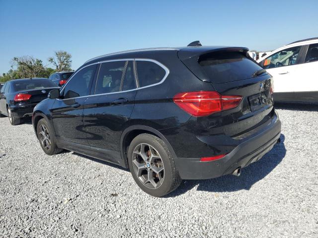 Photo 2 from auction – 2016 BMW X1 XDRIVE2 with VIN WBXHT3C32GP880284