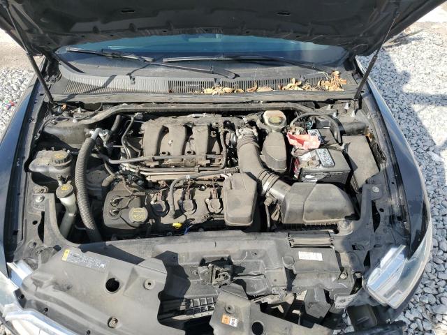 Photo 11 from auction – 2015 FORD TAURUS SEL with VIN 1FAHP2E81FG195833