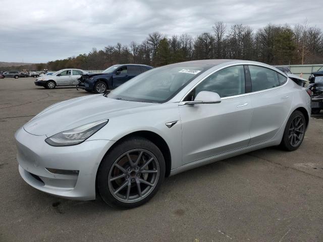 TESLA MODEL 3 2018 with VIN 5YJ3E1EA5JF005199 - Photo from auction