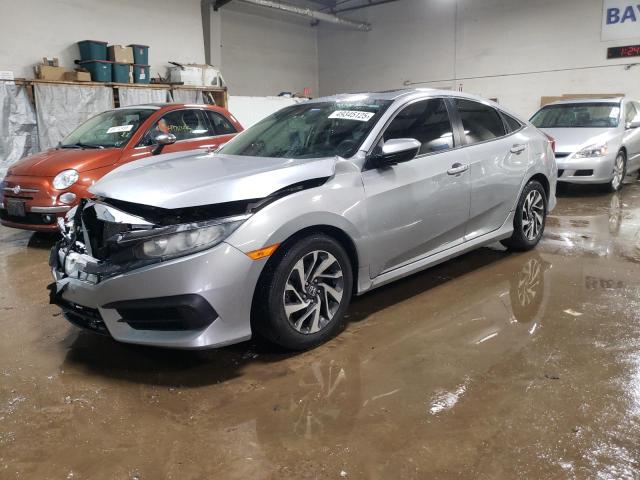 HONDA CIVIC EX 2017 with VIN 19XFC2F74HE081847 - Photo from auction
