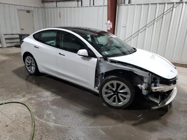 Снимка 4 от търг – 2022 TESLA MODEL 3 с VIN 5YJ3E1EA6NF370531