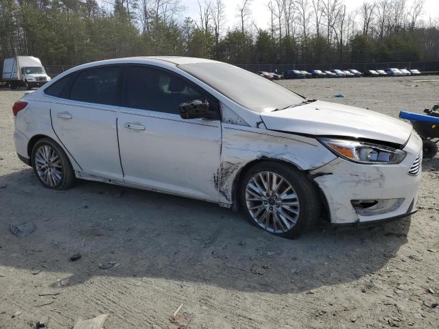 Photo 4 from auction – 2015 FORD FOCUS TITA with VIN 1FADP3J28FL378093
