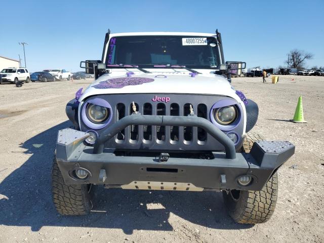 Photo 5 from auction – 2016 JEEP WRANGLER U with VIN 1C4BJWDGXGL168446