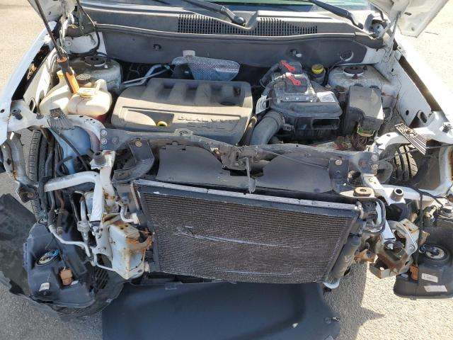 Снимка 12 от търг – 2014 JEEP COMPASS LA с VIN 1C4NJDEB2ED665163