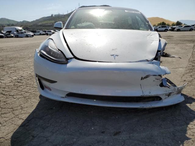 Photo 5 from auction – 2022 TESLA MODEL 3 with VIN 5YJ3E1EB3NF360497