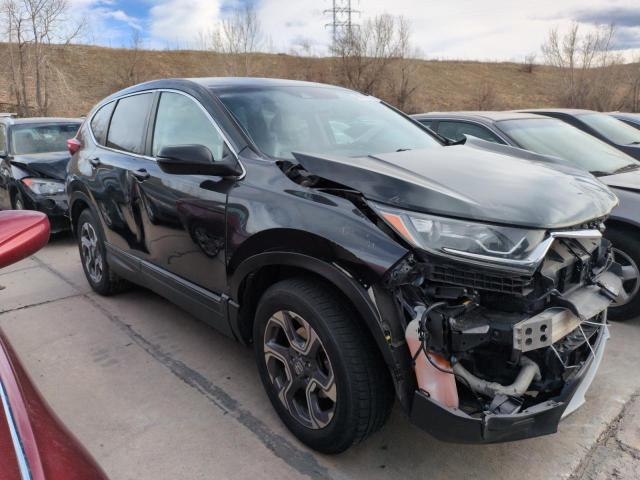 Photo 4 from auction – 2018 HONDA CR-V EXL with VIN 7FARW2H80JE014550