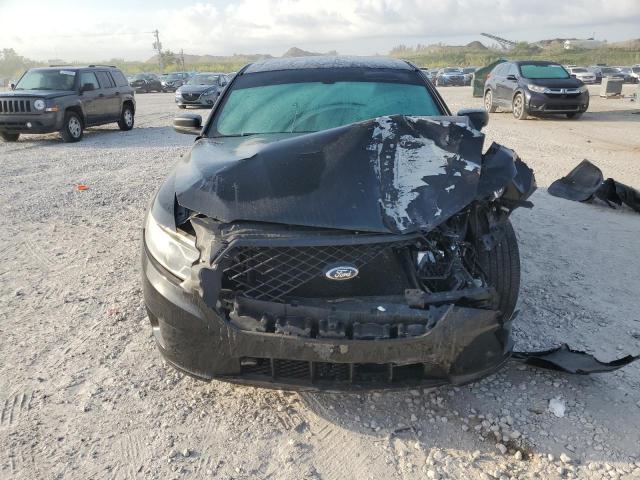 Photo 5 from auction – 2014 FORD TAURUS POL with VIN 1FAHP2MKXEG156363