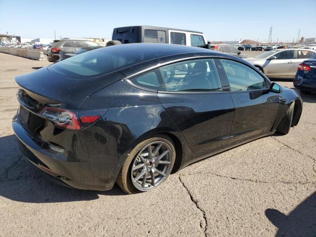 Photo 3 from auction – 2022 TESLA MODEL 3 with VIN 5YJ3E1EAXNF291251
