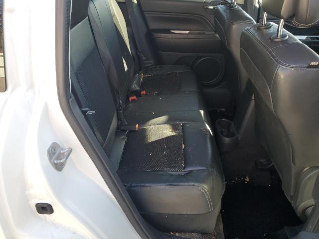 Снимка 11 от търг – 2014 JEEP COMPASS с VIN 1C4NJCEAXED503122