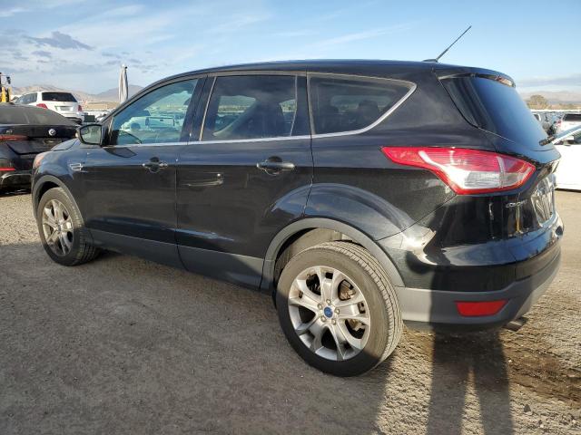 Photo 2 from auction – 2013 FORD ESCAPE SEL with VIN 1FMCU0H96DUA34913