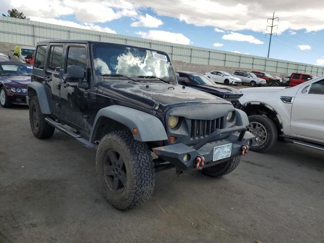 Photo 4 from auction – 2011 JEEP WRANGLER U with VIN 1J4BA3H19BL523176