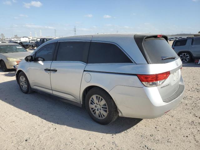 Photo 2 from auction – 2014 HONDA ODYSSEY LX with VIN 5FNRL5H23EB063149