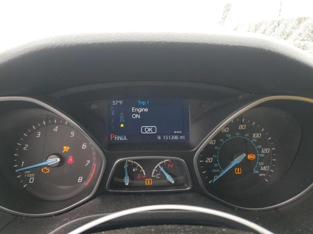Foto 9 de la subasta – 2014 FORD FOCUS SE con VIN 1FADP3K29EL140220