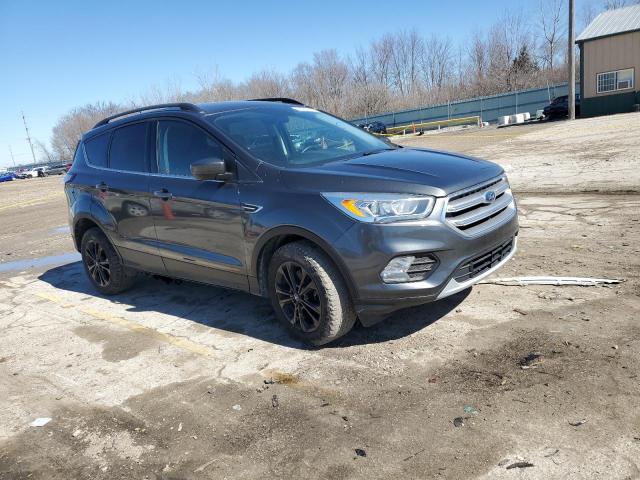 Photo 4 from auction – 2017 FORD ESCAPE SE with VIN 1FMCU9GD1HUE70312