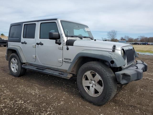 Снимка 4 от търг – 2011 JEEP WRANGLER U с VIN 1J4BA3H18BL579996