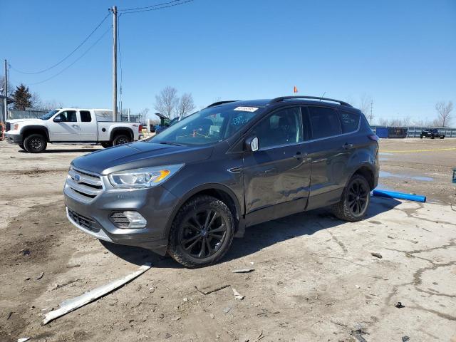 FORD ESCAPE SE 2017 with VIN 1FMCU9GD1HUE70312 - Photo from auction