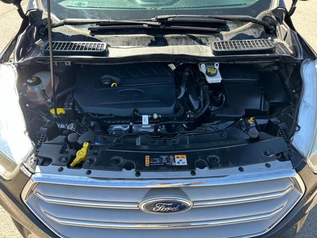 Photo 7 from auction – 2018 FORD ESCAPE SE with VIN 1FMCU9GD7JUA39057