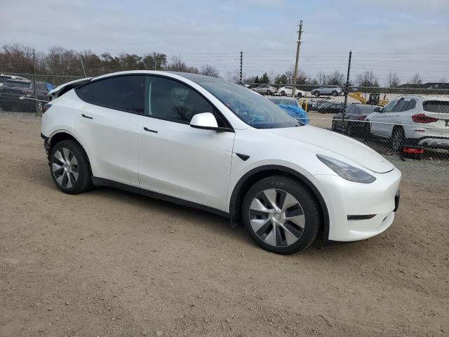 Photo 4 from auction – 2023 TESLA MODEL Y with VIN 7SAYGDEE6PF836551