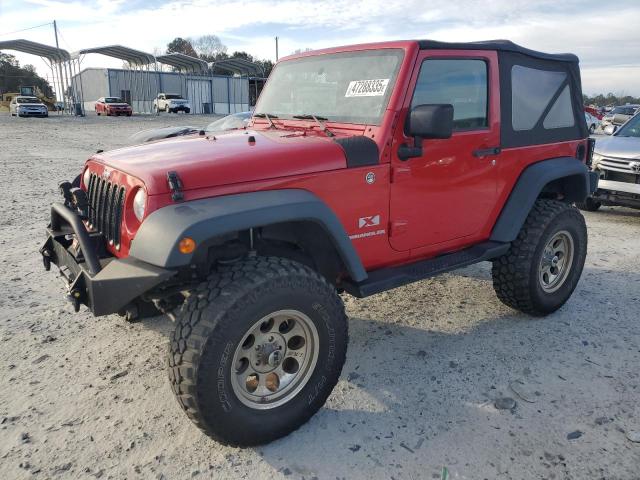 JEEP WRANGLER X 2009 with VIN 1J4FA24129L765920 - Photo from auction