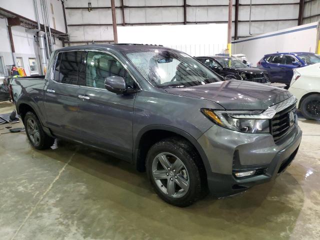 Photo 4 from auction – 2023 HONDA RIDGELINE with VIN 5FPYK3F72PB050212