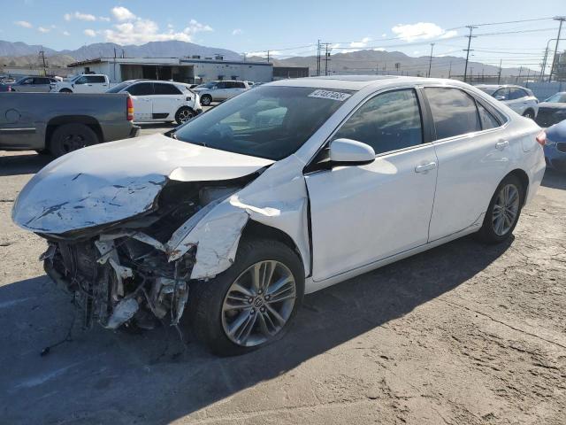TOYOTA CAMRY LE 2015 with VIN 4T1BF1FKXFU077090 - Photo from auction