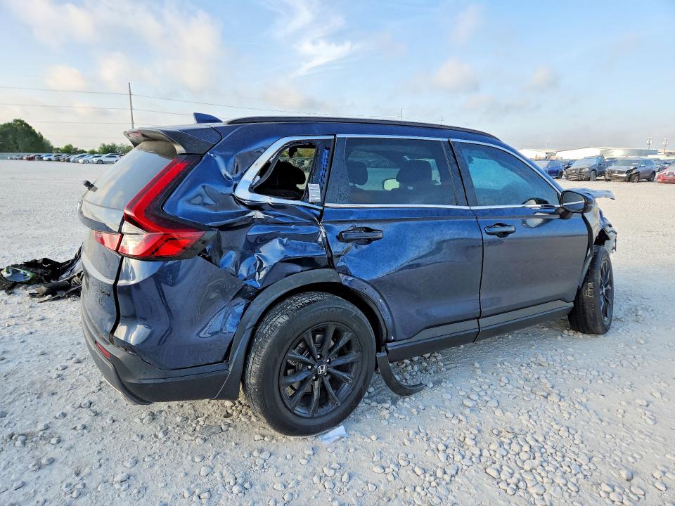 Photo 3 from auction – 2023 HONDA CR-V with VIN 2HKRS5H50PH703223