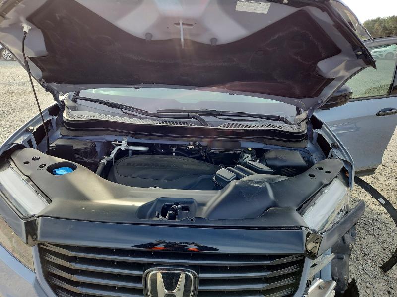 Photo 11 from auction – 2022 HONDA RIDGELINE with VIN 5FPYK3F16NB015732
