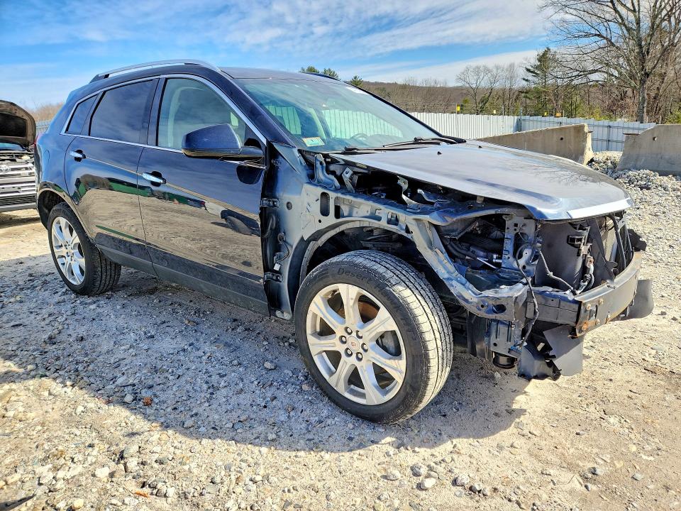 Photo 4 from auction – 2014 CADILLAC SRX with VIN 3GYFNFE39ES575984