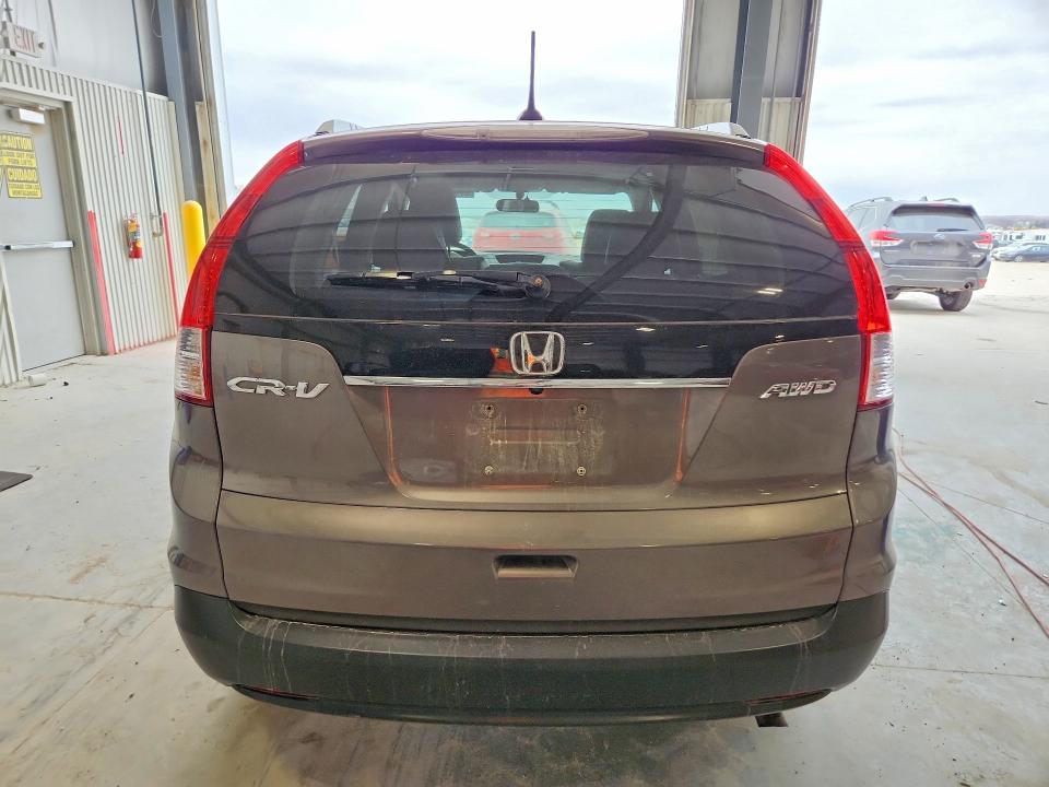 Photo 6 from auction – 2013 HONDA CR-V with VIN 5J6RM4H71DL007428
