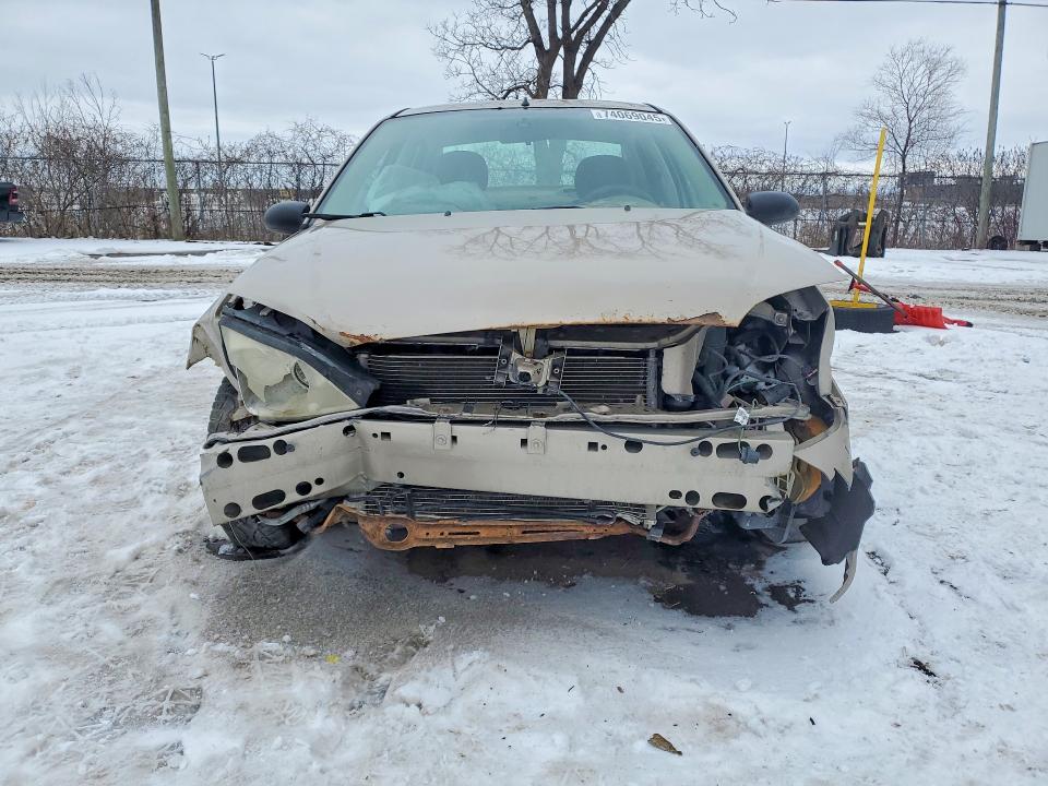 Photo 5 from auction – 2006 FORD FOCUS with VIN 1FAFP34N66W129577