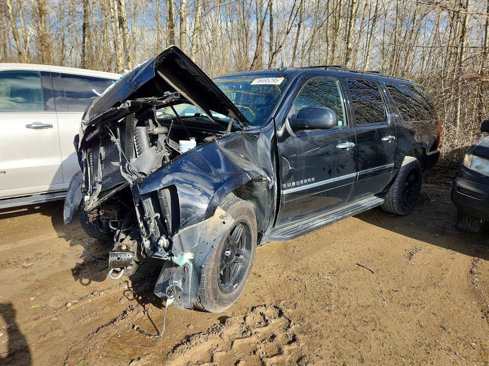 CHEVROLET SUBURBAN 2011 with VIN 1GNSKKE32BR241937 - Photo from auction