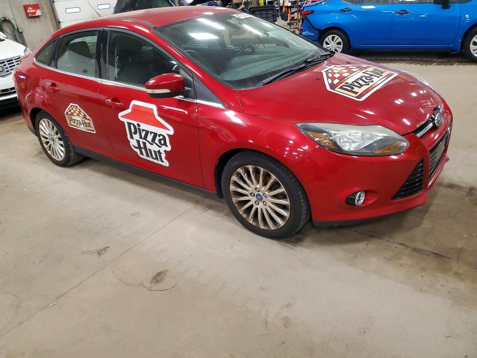 Photo 4 from auction – 2012 FORD FOCUS with VIN 1FAHP3J21CL145430