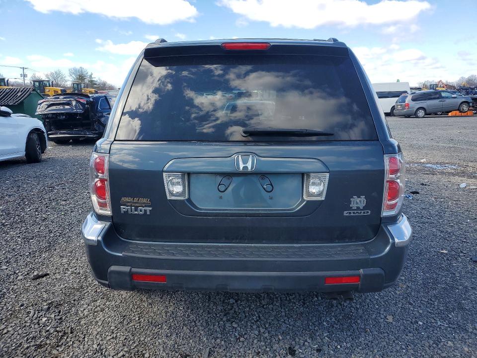 Photo 6 from auction – 2006 HONDA PILOT with VIN 2HKYF18566H548538