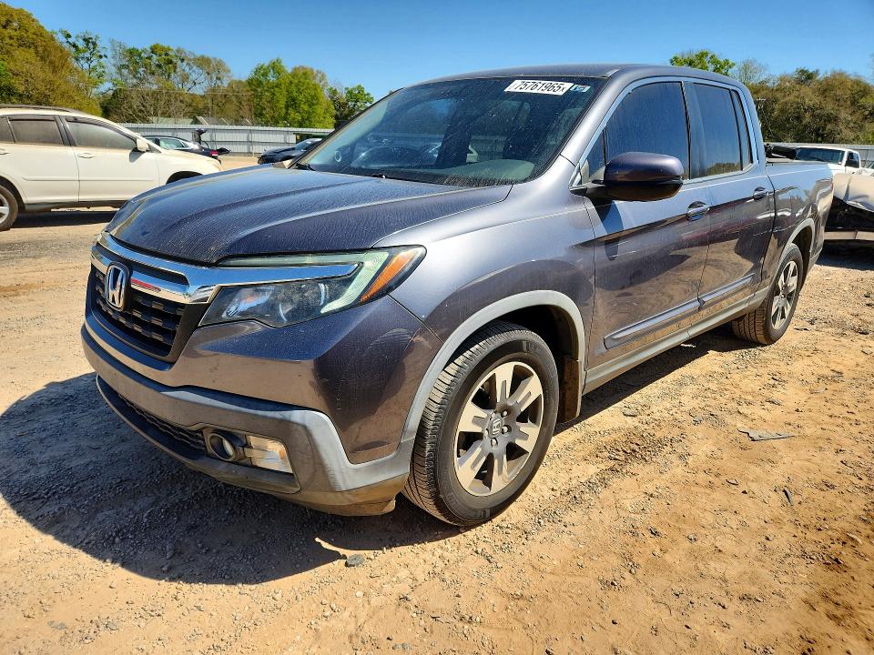 HONDA RIDGELINE 2017 with VIN 5FPYK2F65HB010502 - Photo from auction