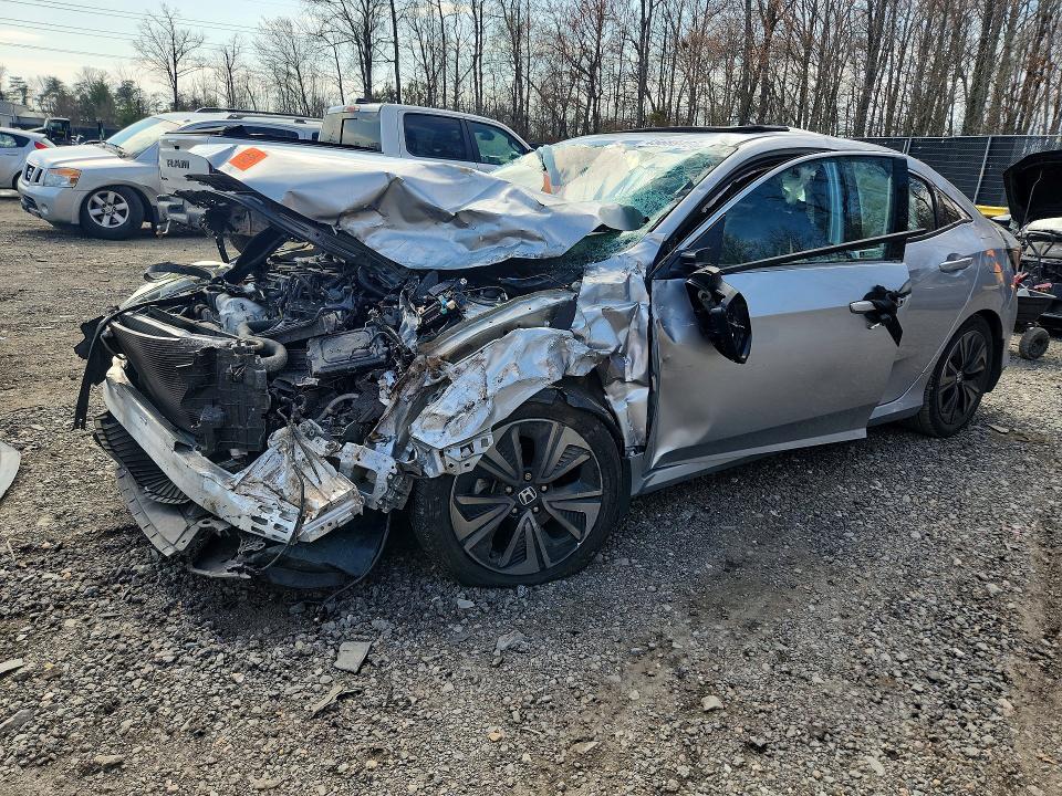 HONDA CIVIC 2018 with VIN SHHFK7H82JU218398 - Photo from auction
